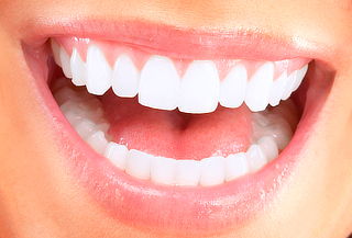Limpieza Dental con Destartraje y Topicación de Flúor