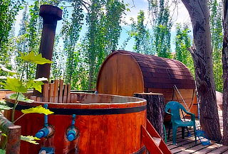 1 Noche para 2 o 4 pers:  Tinaja + Sauna + Cena + Desayuno
