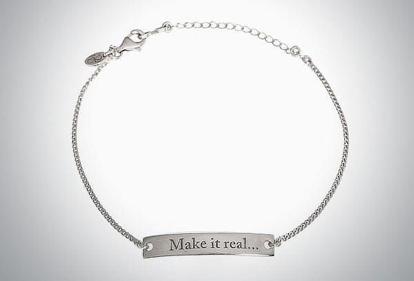 Pulsera con Plaquita en plata con Frase a elegir